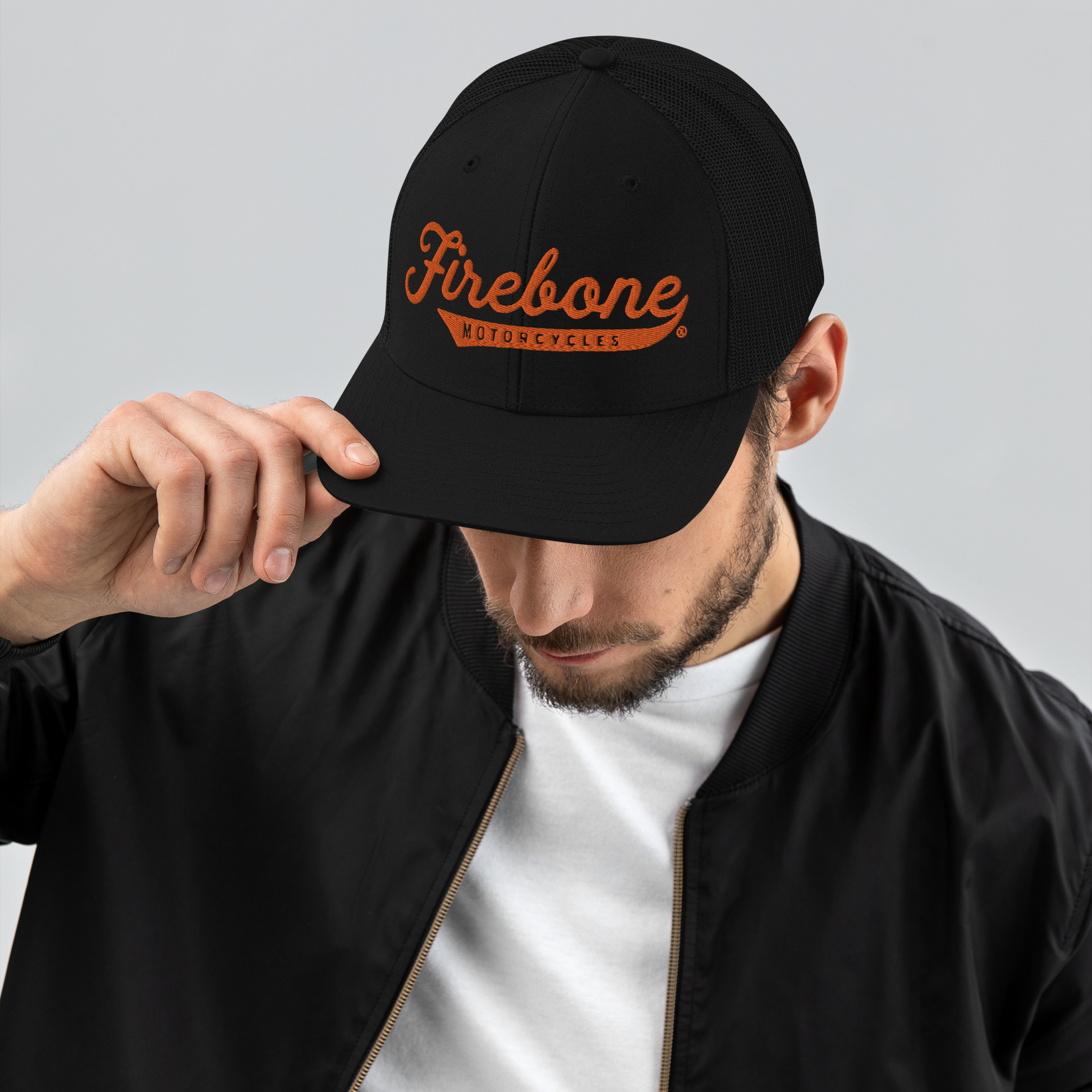 Firebone logo -  Orange logo on trucker cap - Firebone